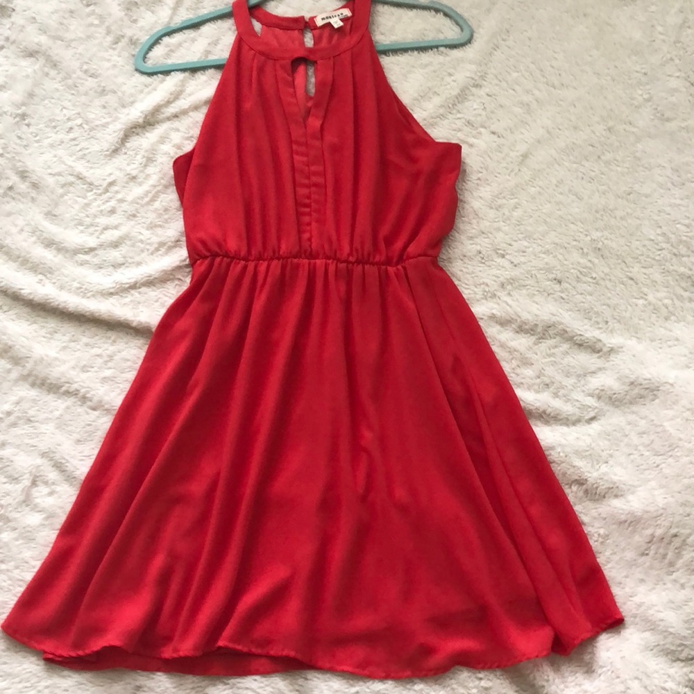 Beautiful coral halter style dress.